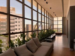 Χώρος καθιστικού στο Flat Premium Quality CoHouse - Tambaú