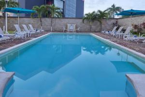 Bazén v ubytování City Express by Marriott Cancun nebo v jeho okolí