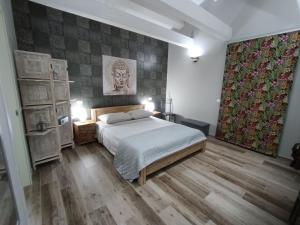 Postel nebo postele na pokoji v ubytování Villa Matilde Ravenna
