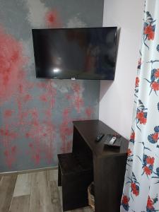 TV a/nebo společenská místnost v ubytování Villa Matilde Ravenna