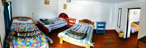 Voodi või voodid majutusasutuse Hostel Rivendell Cusco toas
