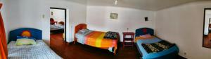 Voodi või voodid majutusasutuse Hostel Rivendell Cusco toas