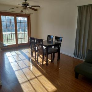 a dining room with a table and four chairs at Spacious Pleasanton Home, 4br-2ba, Kitchen, WiFi, Laundry, Parking and More in Pleasanton