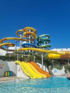 a water slide in a pool at a water park at Villa Melanie in Umag