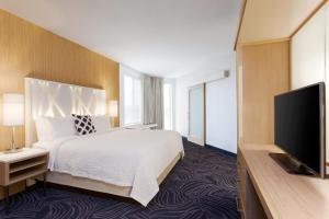 Кровать или кровати в номере SpringHill Suites by Marriott Paso Robles Atascadero
