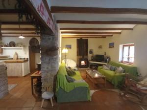 Posezení v ubytování La Casa Del Teix