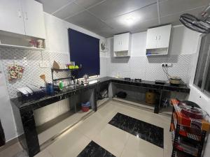 Kuchyň nebo kuchyňský kout v ubytování 3BR House near Toll Yong peng + 21 fotografií