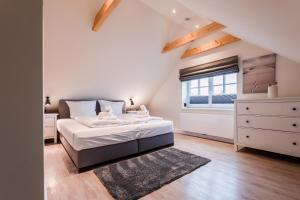 Ένα ή περισσότερα κρεβάτια σε δωμάτιο στο Appartement Wattside