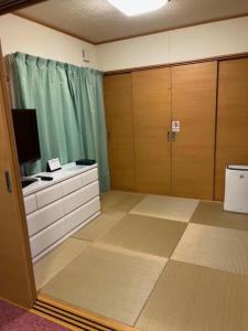 A television and/or entertainment centre at Saijo - House - Vacation STAY 15870