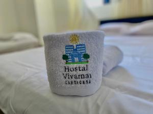 Postel nebo postele na pokoji v ubytování Hostal Viva Mar