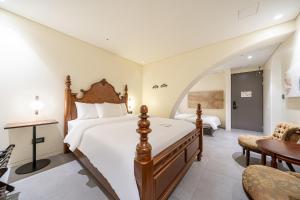 Кровать или кровати в номере Hotel Lemong