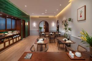 Ruang duduk di Wuyu Hotel, Smart Park & Happy Valley Jinshansi Metro