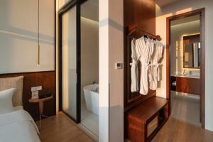 Kúpeľňa v ubytovaní Wuyu Hotel, Smart Park & Happy Valley Jinshansi Metro