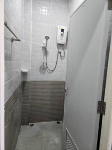 a bathroom with a shower stall with a shower at No 9 HOUSE Hua Hin in Khao Tao
