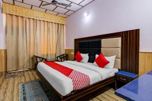 Cama o camas de una habitación en OYO Hotel The Cloud Hills