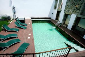 A piscina em ou perto de Casa Dos Poos