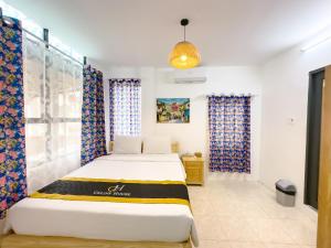 Postel nebo postele na pokoji v ubytování Celine House + 48 fotografií