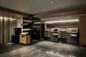 a lobby with several machines in a building at the b osaka-shinsekai in Osaka