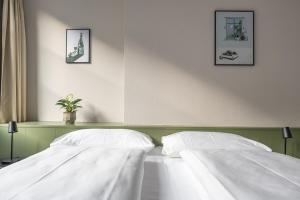 Postel nebo postele na pokoji v ubytování Hotel Goldener Stern - contactless check-in