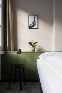 Postel nebo postele na pokoji v ubytování Hotel Goldener Stern - contactless check-in