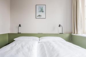 Postel nebo postele na pokoji v ubytování Hotel Goldener Stern - contactless check-in