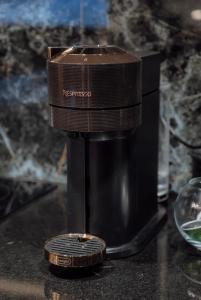 a coffee maker sitting on top of a table at Moonlight in Tsaghkadzor