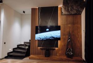 TV a/nebo společenská místnost v ubytování Moonlight
