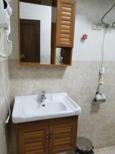 Koupelna v ubytování Armah International Hotel