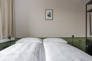Postel nebo postele na pokoji v ubytování Hotel Goldener Stern - contactless check-in