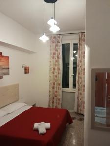 Postel nebo postele na pokoji v ubytování Nautilus Hotel