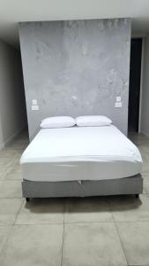 Ein Bett oder Betten in einem Zimmer der Unterkunft Casa de Verano