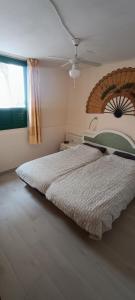 Postel nebo postele na pokoji v ubytování Ap 1ª línea Playa Las cucharas