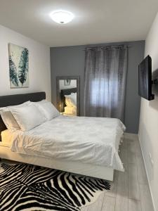 Łóżko lub łóżka w pokoju w obiekcie Apartman Magnolija Umag