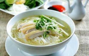 a bowl of chicken noodle soup on a white plate at Apec Mandala Mui Ne 2124 in Phan Thiet