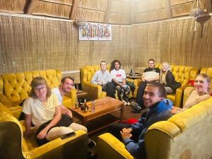 a group of people sitting in a room at Doublegsafaris and camp mikumi in Mikumi