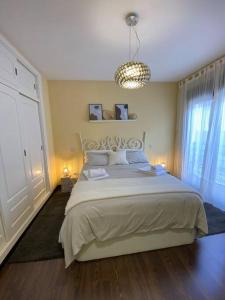 Llit o llits en una habitació de TU ESPACIO:Confort y Diversión.