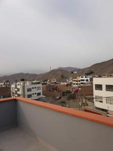 a view of a city from the roof of a building at Hospedaje en La Molina in La Molina