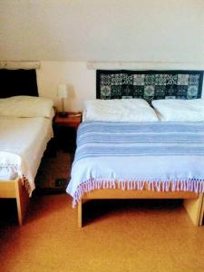 Postel nebo postele na pokoji v ubytování Nádherný klidný apartmán s infrasaunou