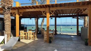 a restaurant with a view of the ocean at Village Light House Dahab in Dahab