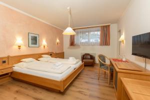 Postel nebo postele na pokoji v ubytování Resort Amadeus-Landhaus Amadeus