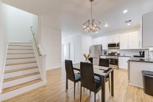 a kitchen with a table and chairs in a room at Townhome in Houston in Houston