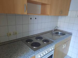 Kuchyň nebo kuchyňský kout v ubytování Bungalow Labahn