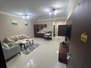 Royal Land Deluxe Suites رويال لاند للأجنحة الفاخرة的电视和/或娱乐中心