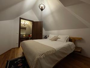 Postel nebo postele na pokoji v ubytování Apartament TISA - CĂTUN