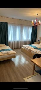 Postel nebo postele na pokoji v ubytování Zak Neuhausen