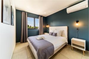 Postel nebo postele na pokoji v ubytování Magnifique villa avec jacuzzi Proximité mer
