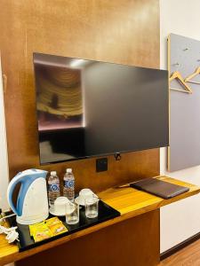 Μια τηλεόραση ή/και κέντρο ψυχαγωγίας στο Cyther Stay Hotel