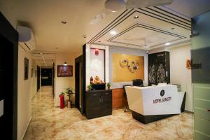 TV a/nebo společenská místnost v ubytování Hotel Suncity