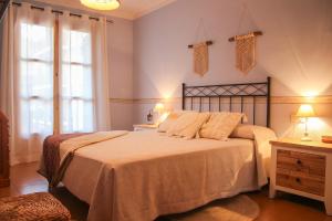 Posteľ alebo postele v izbe v ubytovaní Apartament Montsent