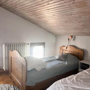 Postel nebo postele na pokoji v ubytování Appartement à la ferme + 38 fotografií